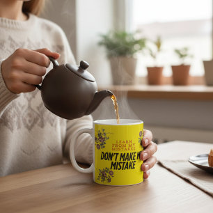 Taza de café con cita motivacional de mentalidad d