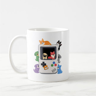 Taza de café con consola retro de Game Boy y perro