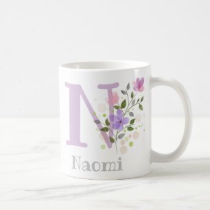 Taza de café con decoración floral