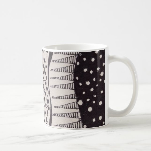 Taza de café con el dibujo blanco y negro (Derecha)