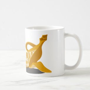 Taza de café con el error tipográfico del pláta