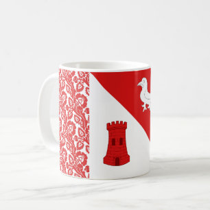 Taza de café con emblema de la población del cantó