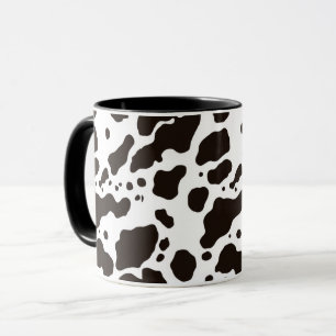 Taza de café con estampado de vaca en negro y blan