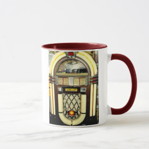 Taza de café con la máquina tocadiscos "danza en