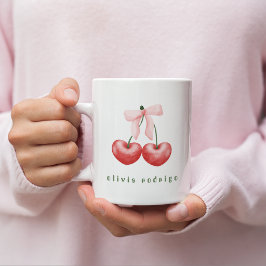 Taza de café con lazo de corazón de cereza roja y 