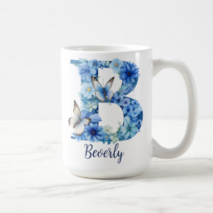 Taza de café con monograma floral azul de 15 oz
