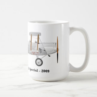 Taza de café con un biplano en él