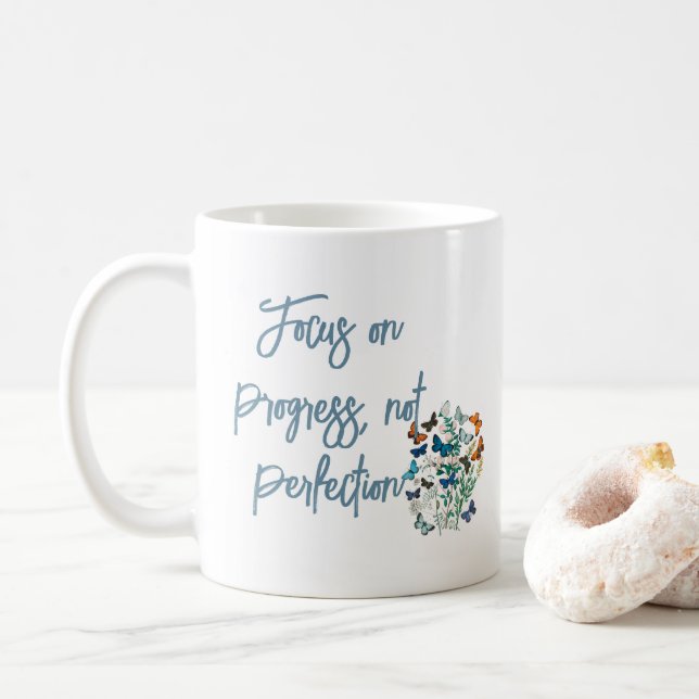 Taza De Café Concéntrate en el progreso, no en la perfección (Con donut)