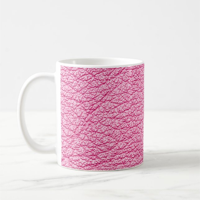 Taza De Café Cuero rosa de cierre, fondo texturado. (Izquierda)