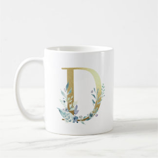 Taza De Café D oro inicial con follaje floral azul