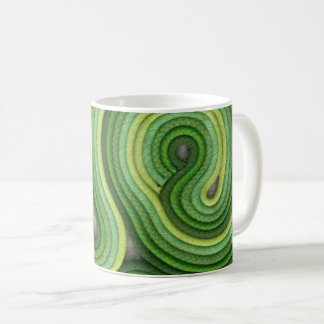 Taza de café de la cuerda que sube