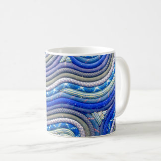 Taza de café de la cuerda que sube