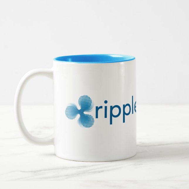 Taza de café de la ondulación de XRP (Izquierda)
