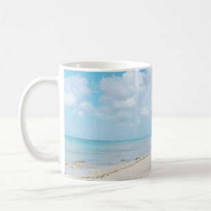 Taza de café de la playa de destino
