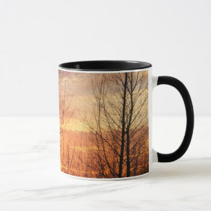 taza de café de la puesta del sol del invierno