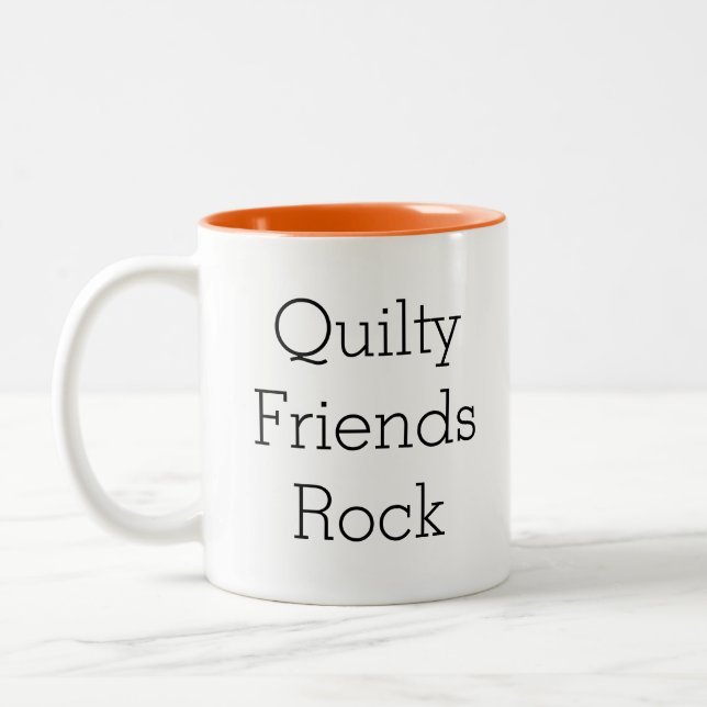 Taza de café de la roca de los amigos de Quilty (Izquierda)