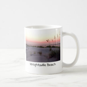 Taza de café de la salida del sol en julio