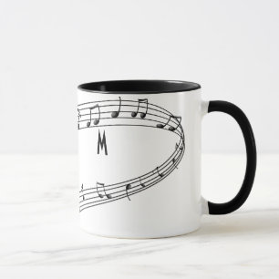 Taza de café de las notas musicales con el