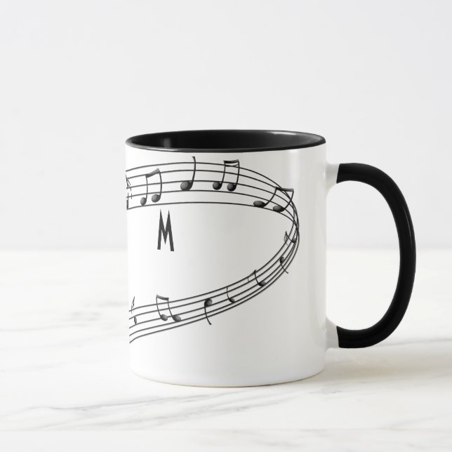 Taza de café de las notas musicales con el (Derecha)