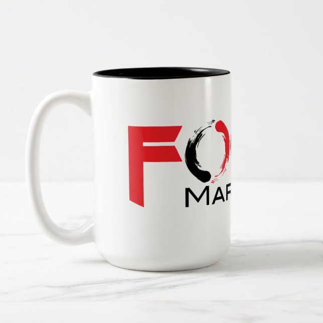 Taza de café de los artes marciales del foco (Izquierda)