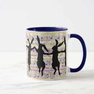 Taza de café de los conejitos del baile