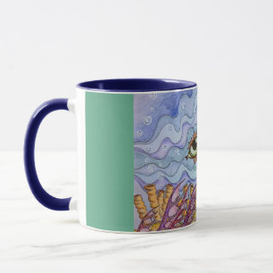 Taza de café de los ojos de pescados del océano