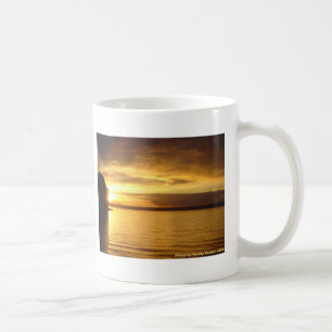 Taza de café de oro del chapoteo