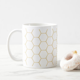 Taza de café de oro del panal