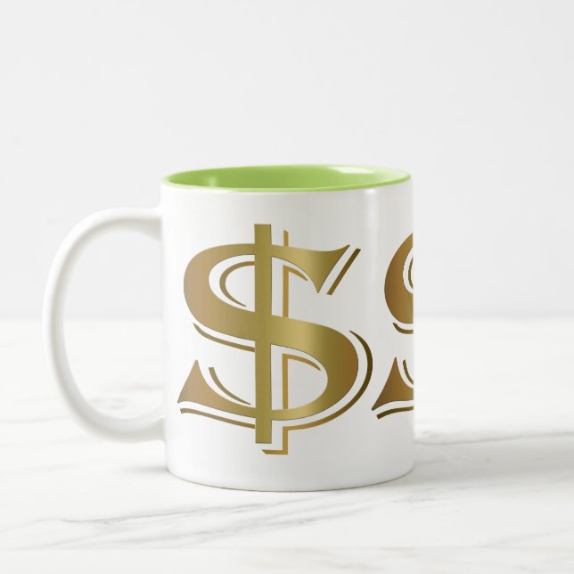 Taza de café de oro gigante del Rótulo de dólar (Izquierda)