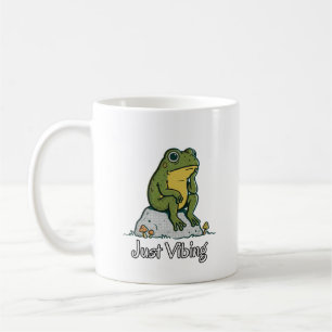 Taza de café de rana con pensamiento caprichoso