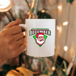 Taza De Café December Legends Gaming Mug: Santa's Arrival<br><div class="desc">Ring in the holiday season with this December-themed gaming mug, proudly stating "Legends were born in DECEMBER". This enchanting design features the iconic Santa Claus, symbolizing the magic of Christmas and celebrating the extraordinary individuals born in this festive month. Elevate your morning ritual or gift it to a December-born legend...</div>