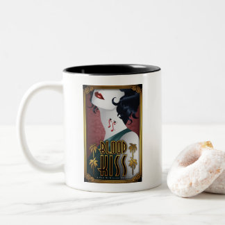 Taza de café del beso de la sangre con los dos