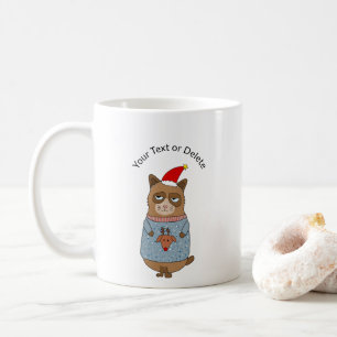 Taza de café del gato gruñón con un suéter feo