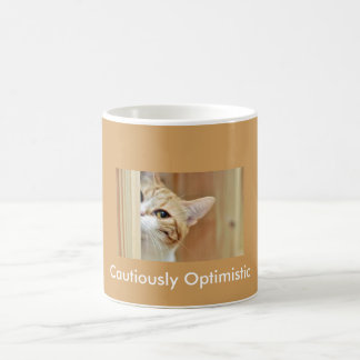 Taza de café del gato… prudentemente optimista