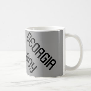 Taza de café del muchacho de Georgia