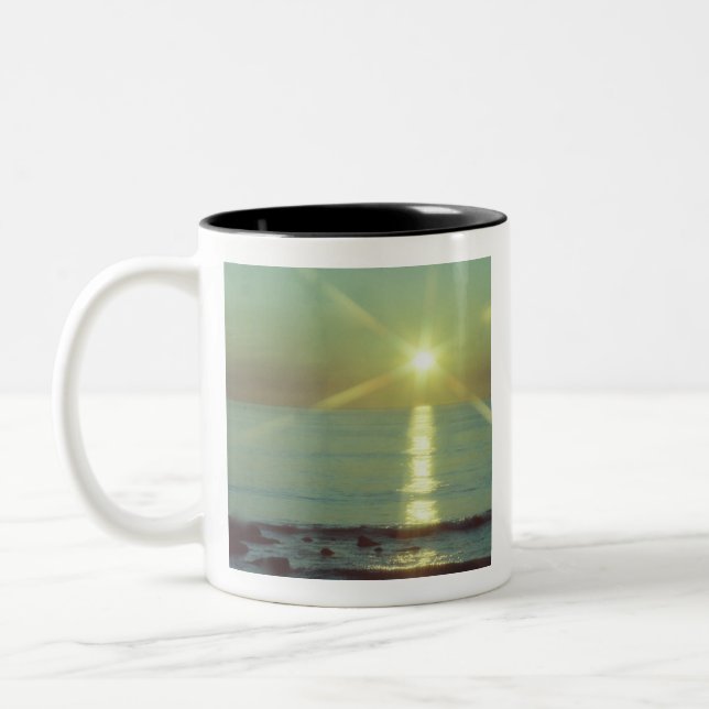 Taza de café del océano de la puesta del sol (Izquierda)