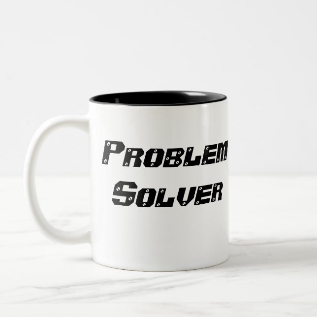 taza de café del solucionador de problemas (Izquierda)