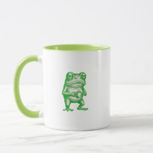 Taza de café divertida de la rana gruñona lunes po