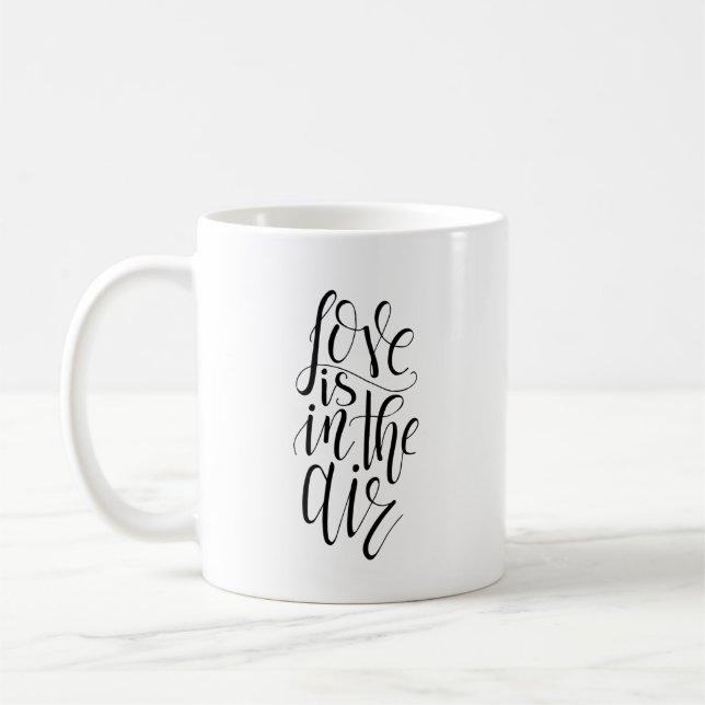 Taza De Café El Amor Está En El Aire Mug (Izquierda)