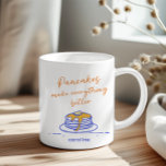Taza De Café El arte del desayuno divertido de los amantes del<br><div class="desc">Comience el día con una sonrisa en esta taza personalizada con temática de panqueques, perfecta para los amantes del desayuno y del brunch. Con una encantadora pila de crepes dibujadas a mano que gotean con jarabe y emparejadas con cálidos tonos naranja y azul vibrante, este diseño es a la vez...</div>