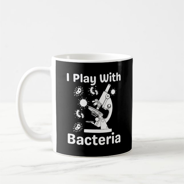 Taza De Café El Fundido Microbiólogo Que Juego Con Las Bacteria (Izquierda)