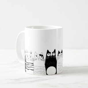 Taza De Café El gato adorable sentado