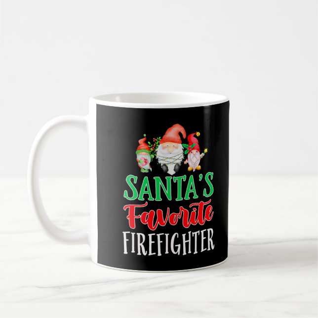Taza De Café El gnomo divertido de Navidad favorito del bombero (Izquierda)