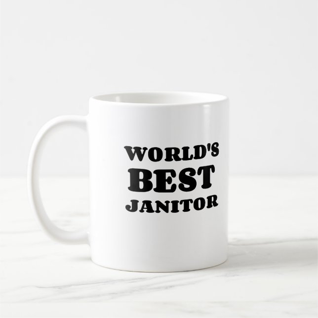 TAZA DE CAFÉ EL MEJOR JANITOR DEL MUNDO (Izquierda)