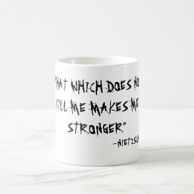 TAZA DE CAFÉ "EL QUE NO ME MATA ME HACE MÁS FUERTE" (Centro)