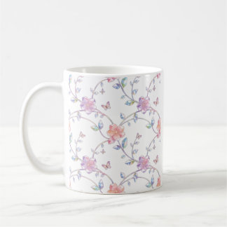 Taza de café elegante con mosaico floral pastel de