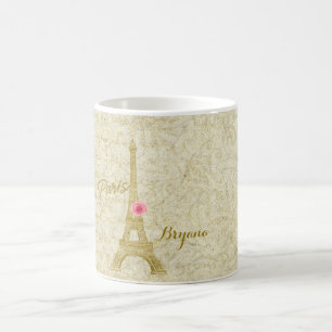 Taza de café elegante dorada y rosa de la Torre Ei