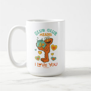 Taza De Café Elmo sosteniendo su pez dorado mascota