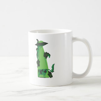 Taza De Café emisión encima de verde de la vaca