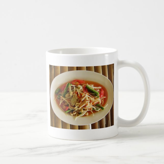 Taza De Café Ensalada de Papaya picante [Som Tam] ... Comida la (Derecha)